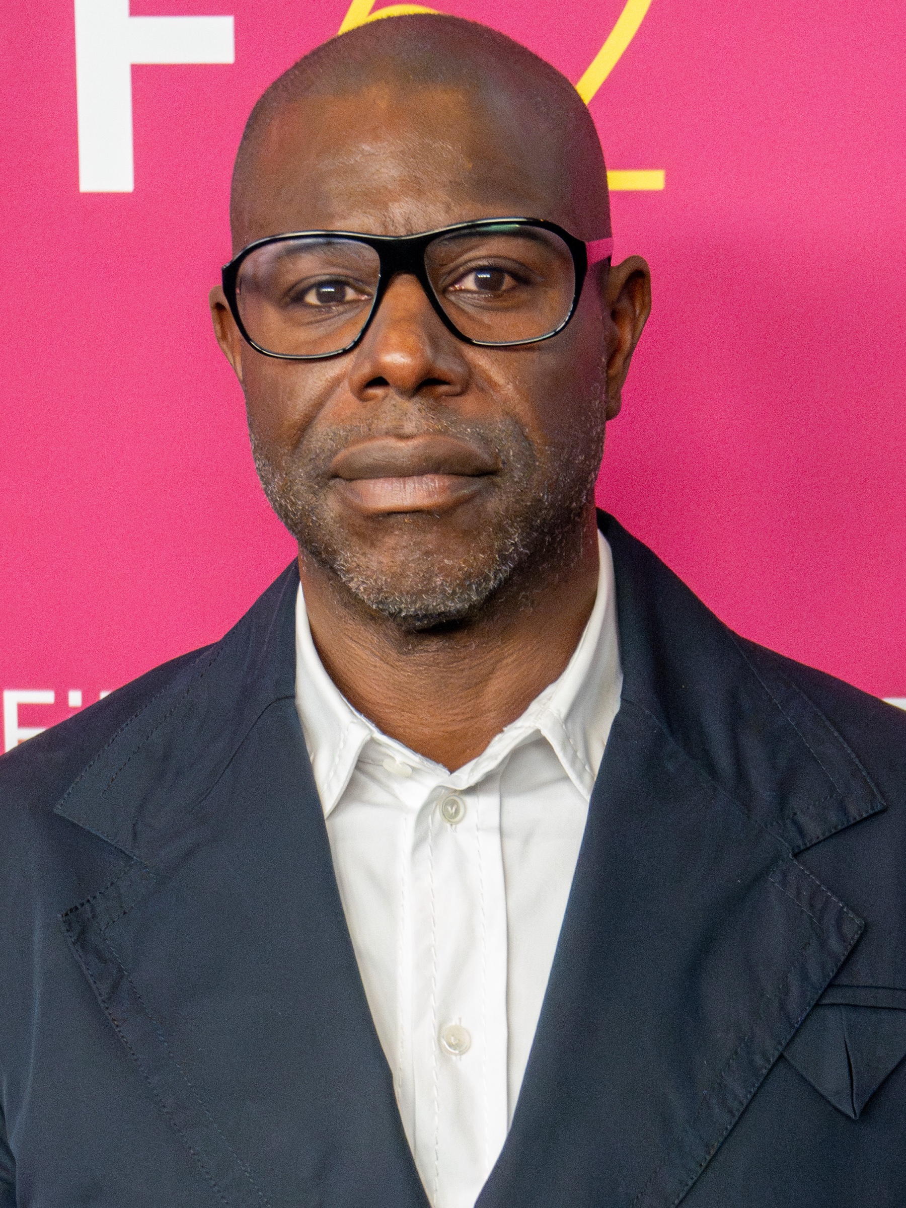 Steve McQueen in glasses and a dark jacket at the New York Film Festival
